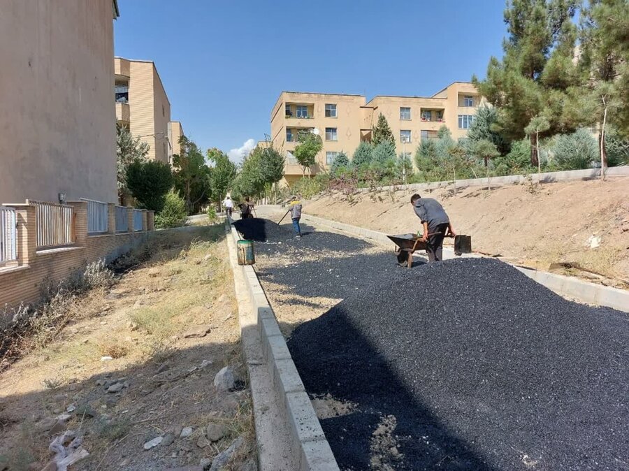 عملیات اجرای زیرسازی و روکش آسفالت خیابان تربیت ۸ واقع در حسن آباد