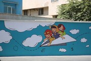 کرج با زیباسازی دیوارهای مدارس به استقبال ماه مهر می‌رود